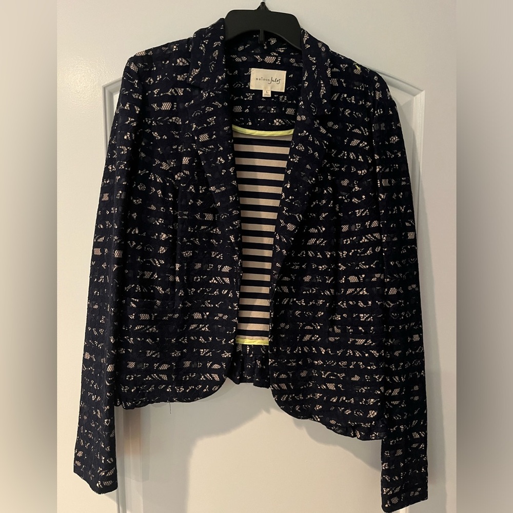 Navy blue, lace overlay jacket with beige showing through. Size large.